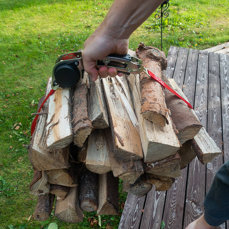 Logs being carried with QUICKLOADER Grip Carrying Handle 
